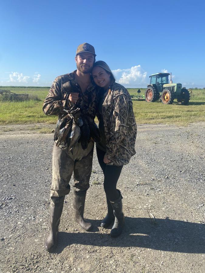 Couple with their morning limit on a South Louisiana levee road